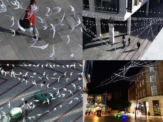 4 images, showing swifts made of salvaged plastic milk bottles and copper wire hung high above an outdoor shopping centre