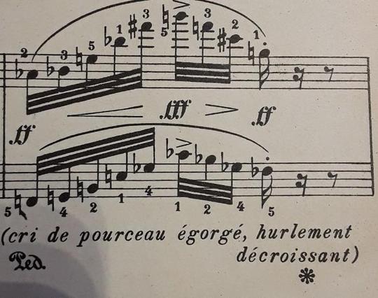 Une partition de musique avec les indications suivantes sous la portée : cri de pourceau égorgé, hurlement décroissant
