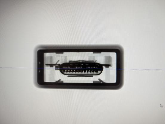 A white background with a black rectangle. It's hollow in the middle. Is an oval shape also black with some spiky bits pointing downwards