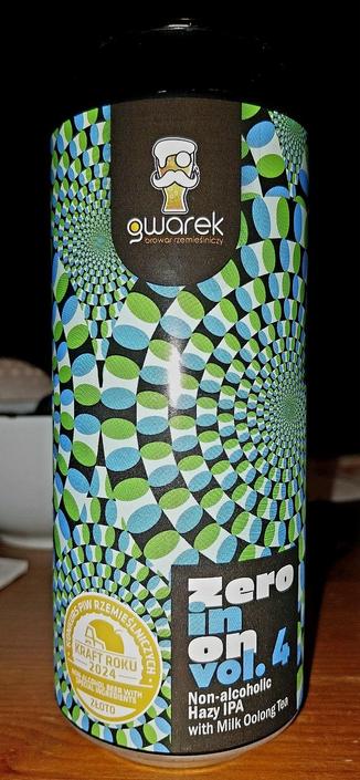 A wildly painted can of non-alcoholic beer made by Browar Gwarek.