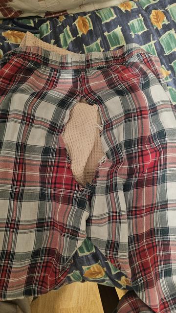 Check pyjamas with sparkly bits. I love these pyjamas. My nanna would be so pissed to see the massive 20cm rip in them straight down the Crack and seam.