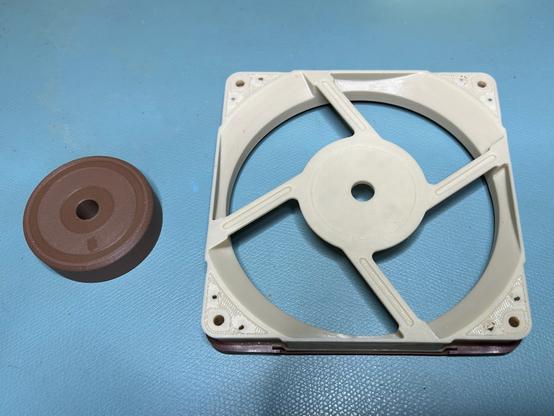 The same 3D printed Noctua fan replica.  The frame has been turned upside down to show the webbing that matches the original.
