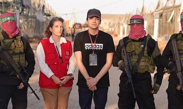 Edan Alexander is pictured with Hamas freedom fighters and red cross workers.

Edan Alexander was captured on Oct 7th 2023 at an Israeli military base where he served. Edan has dual citizenship to Israel and the US