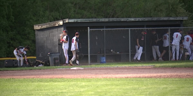 Person hospitalized after bleachers upend at high school baseball game