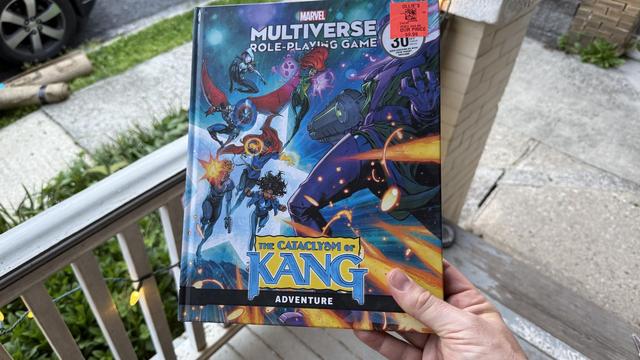 A photo of the Kang sourcebook for the Marvel Multiverse RPG