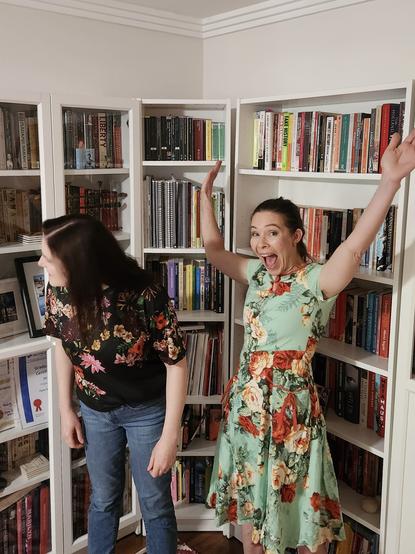 Just some more of our usual chaos. What has Dr Rad seen? And what will Dr G do next? At least we have matching flowery outfits. Dr Rad leans over and appears to look out of frame while Dr G hams it up for the camera with hands raised.