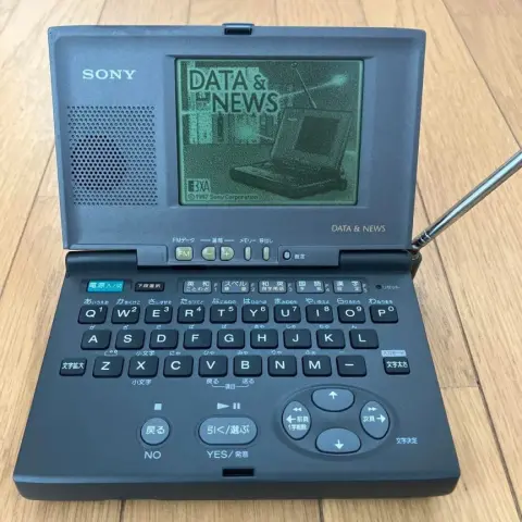 SONY DD-MR10 mini computer pda looking thing with a black and white lcd screen
