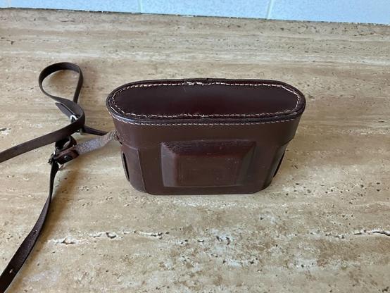 Photo showing the rebuilt case for the Zeiss Ikonta 524/16 camera that used to belong to my father. The stitching is functional if not perfect. Colour is great.