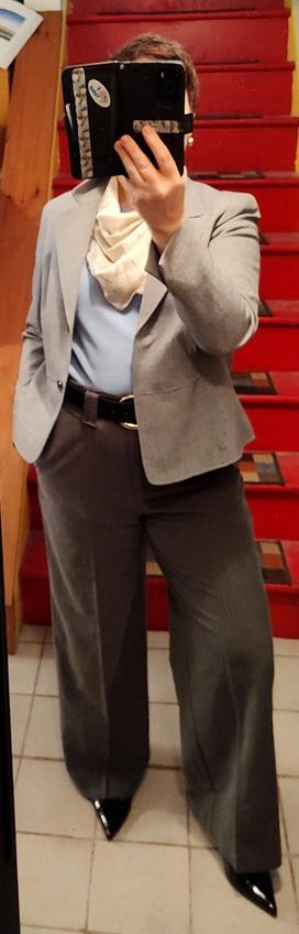 Pale blue T, dark grey wide leg trousers, pale grey cropped blazer, pale yellow and blue silk neckerchief. Black belt and slingbacks.