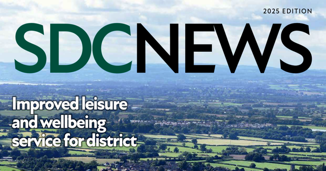 Top part of the printed newsletter.  Titled SDC News 2025 Edition.  Improved leisure and wellbeing service for district.  In the background a patchwork of green fields spreads into the distance.  The photo was probably taken at Coaley Peak.