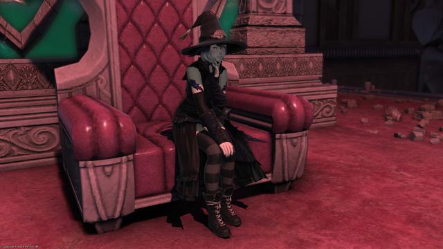 Yozora strikes an evil pose atop of the throne