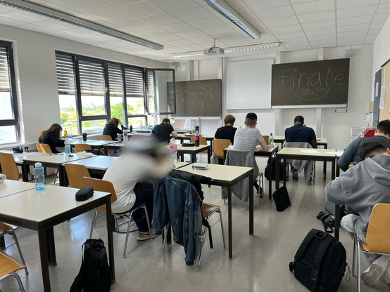 Students sitting an exam in a classroom