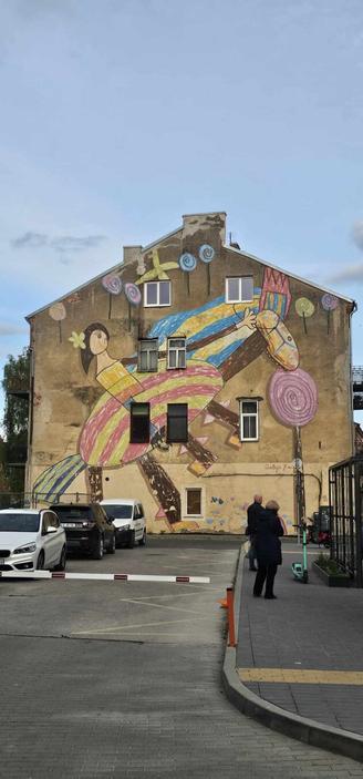 "Happy childhood" by Gyva Grafika in Kaunas, Lithuania
