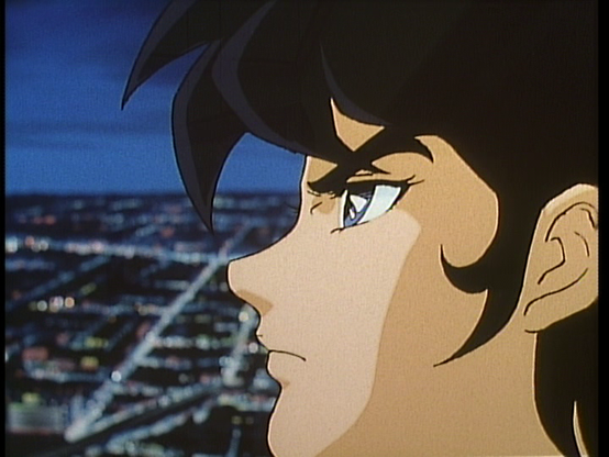 Closeup on Ryo's face. In the background is the cityscape, slightly out of focused.