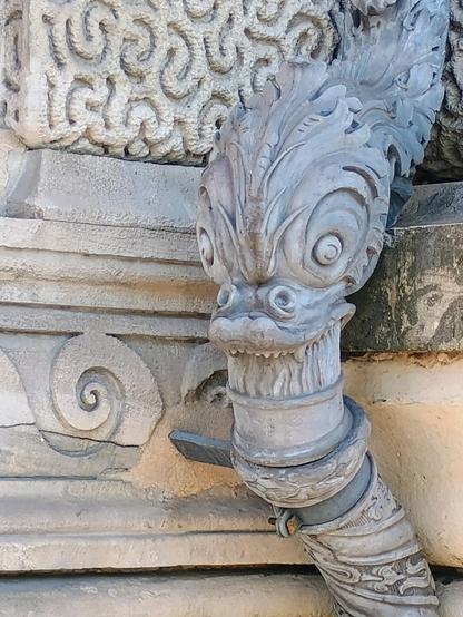 a joint in a downspout outside the Louvre museum