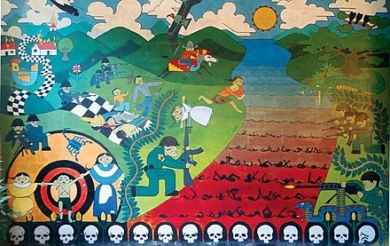 Colorful mural of the massacre at the Sumpul River made by the survivors and family members of the victims, on display in Arcatao, Chalatenango, El Salvador. Shows a soldier with an M16 kneeling by the river, which is red and full of black human corpses. On the hillside behind him, children and families are being shot at by soldiers. Skulls line the bottom of the mural. By Elhesinberg - Own work, CC BY-SA 4.0, https://commons.wikimedia.org/w/index.php?curid=106983490