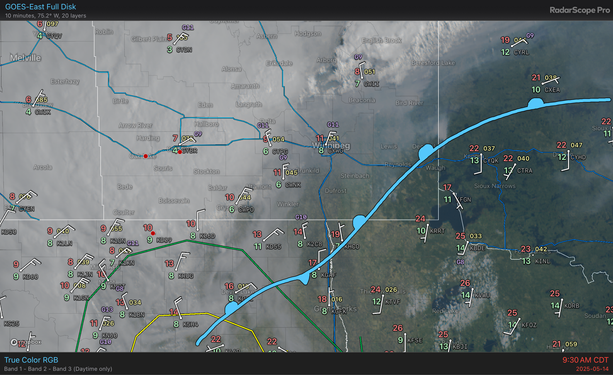True colour satellite imagery of southern Manitoba and northern North Dakota and Minnesota. The satellite imagery is overlaid with surface weather station plots and a drawing of a frontal boundary. Smoke from wildfires in southeast Manitoba is visible in the source region as well as westwards towards the visible cloud edge.