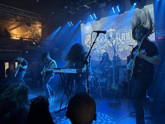 Blue lit stage, projected logo, five piece including keyboards headbanging like there’s no tomorrow. Maybe there isn’t.