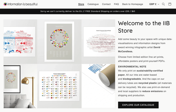 Homepage of Information is Beautiful (IIB) store showing sample data visualization prints, including a left-right comparison chart, a colorful circular diagram, and a word cloud of books. The page includes store navigation, environmental notes about sustainable printing practices, and a welcome message introducing David McCandless's work