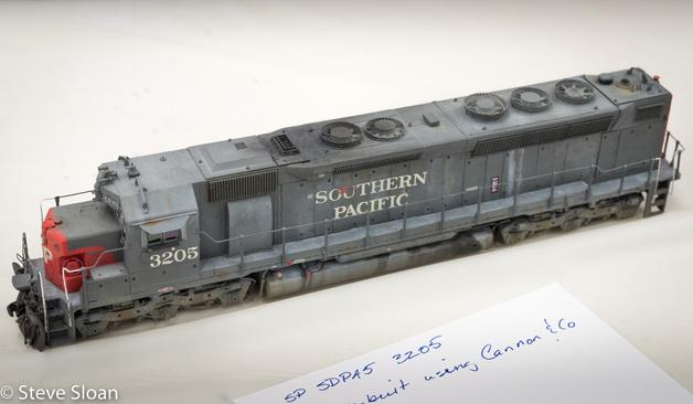 Elizabeth Allen's 3205
Elizabeth Allen's superb model of Southern Pacific (SP) SDP45 3205 was on display at the Saturday, June 21, 2014, Bay Area Prototype Modelers (BAPM) meeting in Richmond, CA.
The real SP 3205 was an EMD SDP-45, SP Class EP636-1. Reportedly: it was built in 1967, builders number 32854, SP 3205, SP Class EP636-1. These were later reassigned to freight service and reclassified in 1985 to SP Class EF636-13. SP 3205 was retired in 1986, sold in 1988 and scrapped.