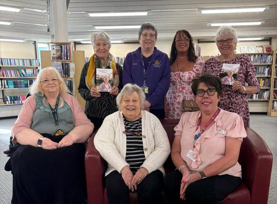 Cllr Kathy Coe MBE and Cllr Di Evans with staff and volunteers from MHA Communities and Friends of Burntwood Library