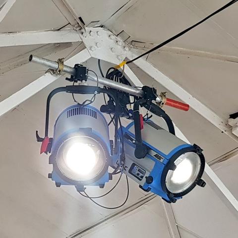 Film and television lighting equipment on a film set.