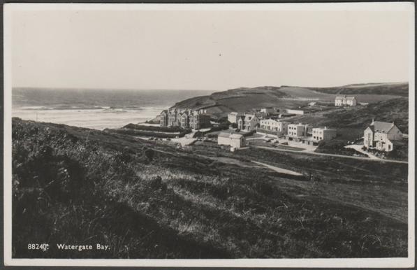 Monochrome real photographic postcard showing a view of the hotels and houses in the valley at Watergate Bay in Newquay, Cornwall.

Publisher not stated, No 88240, c.1930s.

Postally unused, but with short message.

Very good condition, with very slight corner bumps.