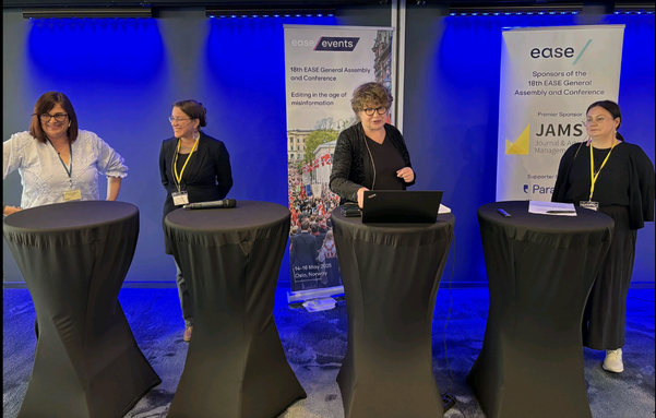 The panellists at the EASE conference podiums.