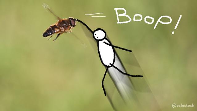 A photo of a hovering dark yellow and black bug (some kind of drone fly I think) against a soft green backdrop. A simple figure has been drawn leaping up to boop the fly on the nose. The word BOOP! has been scribbled above, for the avoidance of doubt.