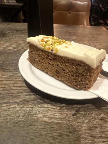 Slice of carrot cake on a plate