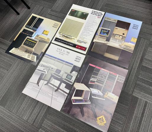 A group of 5 vintage computer posters available for a donation.