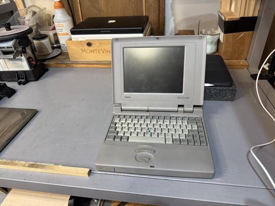 A vintage Toshiba laptop in my workshop