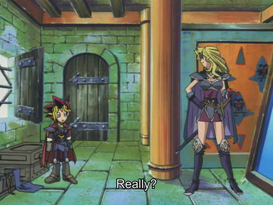 Yugi is asking Mai "Really?" and she is like 6 feet tall and he is like 3
