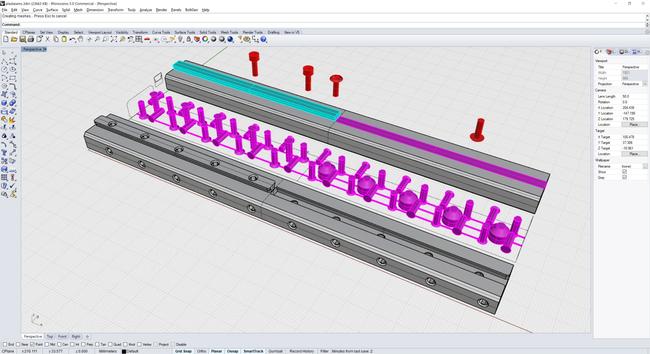 A complex screenshot from 3D modelling program Rhino 3D. It shows a long rectangular bar with a long blue tab running up one half and long magenta slot cut out of the other half. Below that is a repeating series of small magenta cylinders, these are the positives of screw holes that will be present in the final model. Below this is a copy of the final model, the long bar with the tab and slot and screw holes along its length.
