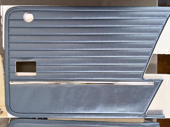 New door card with polished trim from old door