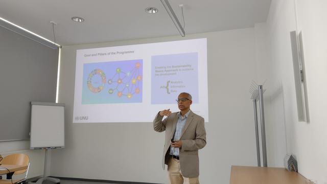 Mir Matin giving his talk.