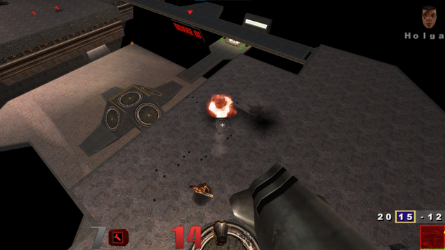 Screenshot of in-game quake with a player looking down on a situation where a rocket launcher just exploded.