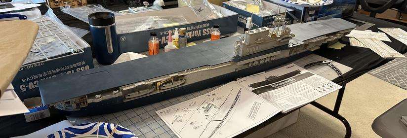 1/200 scale Yorktown CV-5 model assembled in a very messy workspace