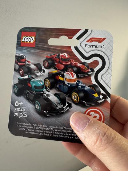 Packaging for an F1 minifigure style car, showing 3 cars and the icon “12 to collect”. For ages 6+. 29 pieces.