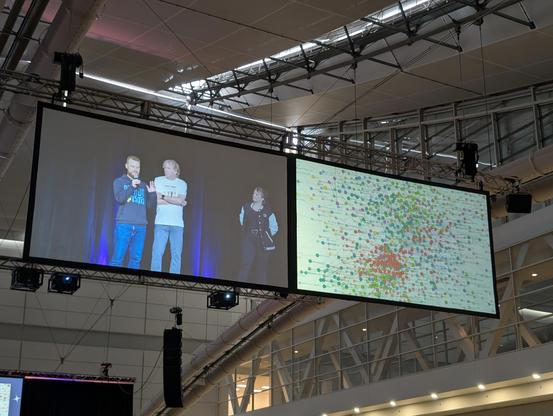 An extremely chaotic and dense graph of colored, connected dots.