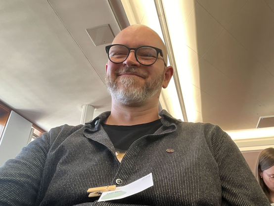 Selfie by Felix Bach, smiling into the camera.