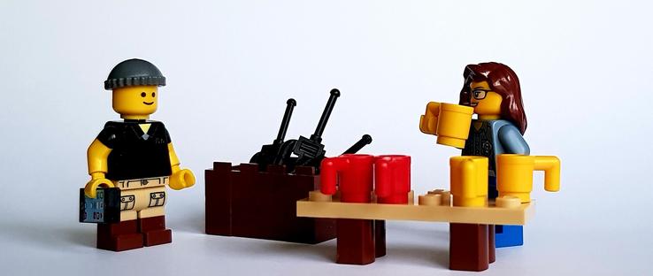 Lego Pete Carrier with one or more two-way radios