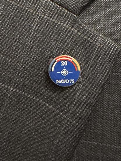 Close-up of my lapel pin with the three Baltic flags, the NATO logo, “NATO75”, and “20” representing 20 years of NATO membership on the part of Estonia, Latvia, and Lithuania.
