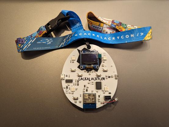 CackalackyCon electronic badge and lanyard