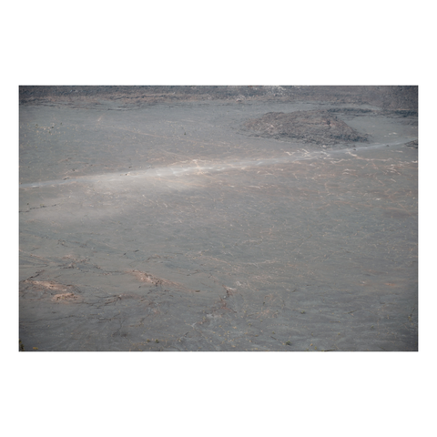 trail worn into surface of cooled lava lake
