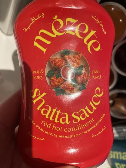Picture showing a squeeze bottle of delicious shatta sauce by mézete.