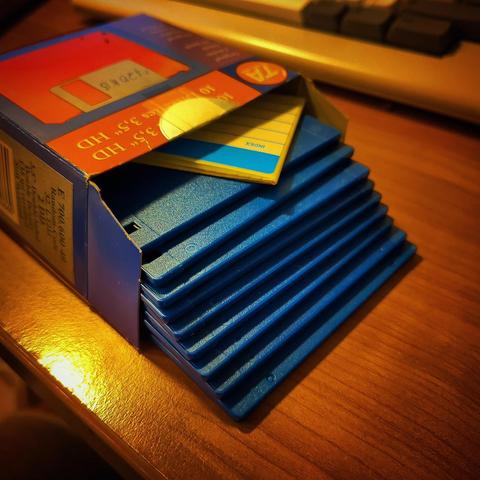 The box is opened. We see 10 floppies.