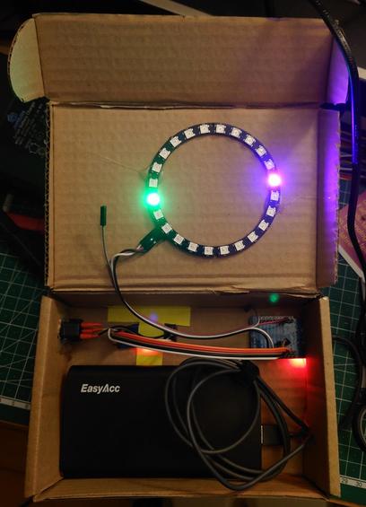 Picture of the insides of the receiver cardboard box, it shows the listed components inside.