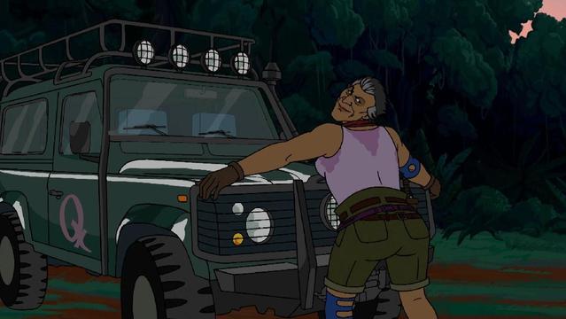 Ginny on her hummer car, with white streaks in her short hair and blue elbow brace and blue leg brace