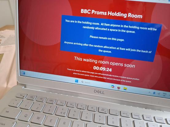 Photo of a laptop screen. The BBC Proms Holding Room. Waiting to join the queue. Opens in less than 10 minutes